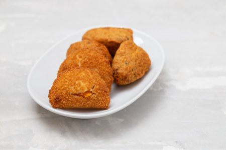 typical portuguese appetizer on small white dish on ceramic