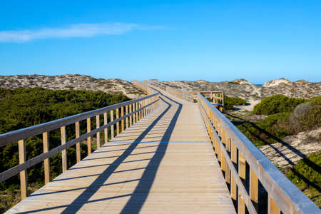 natural wooden walkway in Peniche, Portugal in day lightの写真素材
