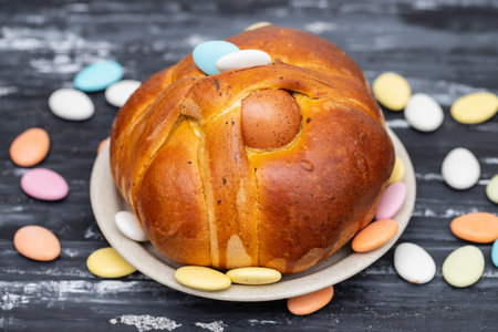 Fresh portuguese Easter folar with egg on dish