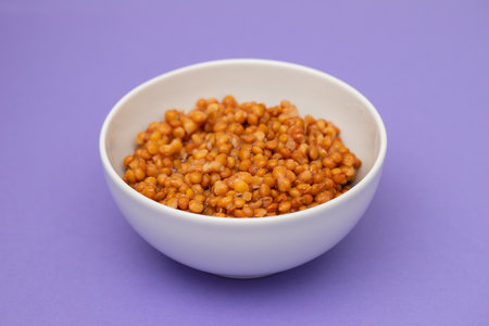 Boiled lentils in white small bowl - Vegetarian foodの写真素材