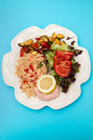 homemade burger grillet without bread and with lemonの写真素材