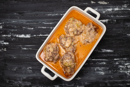 Fried cutlets from minced meat dish with tomato sauceの写真素材