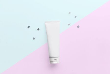 white bottle on pink and blue backgroundの写真素材