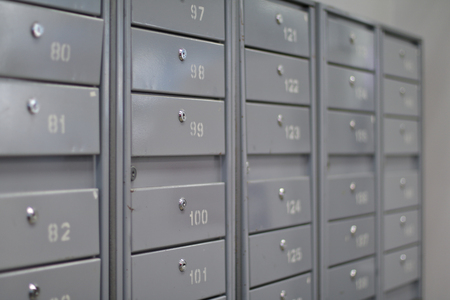 Locker iron mailboxes postal with numbering and key for keep your information. Row, row of drawers, postal, newspaper, locker. Small storage optionの写真素材