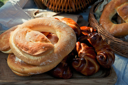 Kalach- traditional hand bread baked East Slavic bread. Delicious fresh breakfast in country style,...