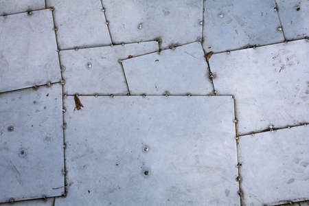 texture. sheets of white metal with rivets. metal background. space for text.の写真素材