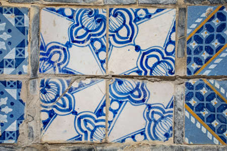The texture of the old ceramic tile with oriental ornament. Abstract background for design.の写真素材