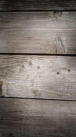 Vertical dark wooden background from old boards