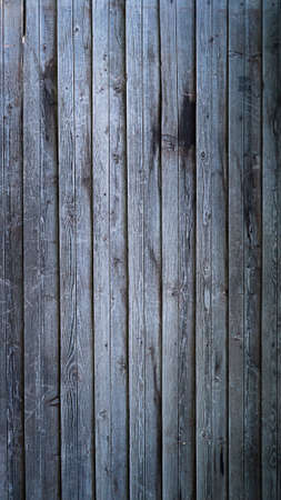 Planks of an old barn wooden vertical gray backgroundの写真素材