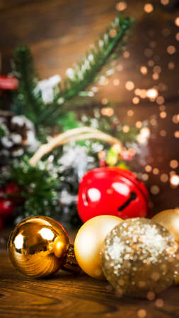 Christmas background with copy space, golden Christmas decorations and holiday and magic atmosphere, suitable for postcards and gift bagsの写真素材