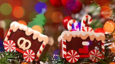 Christmas photo card with toy Train close-up and bokeh. Christmas card, congratulation, holiday packageの写真素材