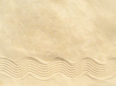 Drawing of waves on the sand on the beach, sand patternの写真素材