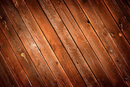 Brown rich wooden background from diagonal planksの写真素材