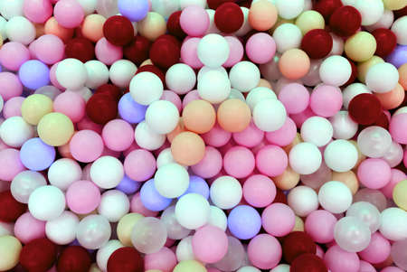 Multi-colored balls in the pool top viewの写真素材
