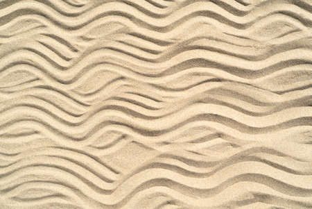 Texture of sea sand background closeup with ornamentの写真素材