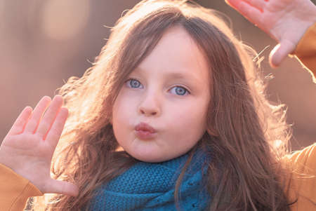 Portrait of a girl of a fair-haired girl with blue eyes close-upの写真素材