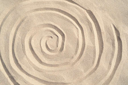 Texture of sea sand background closeup with ornamentの写真素材