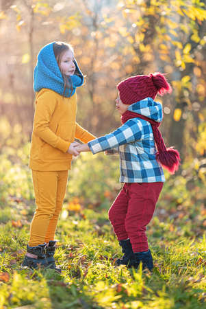 Children hugging, concept against war, peaceful lifeの写真素材