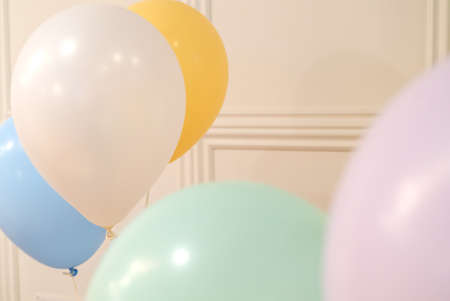 Festive colorful pastel balloons close up background