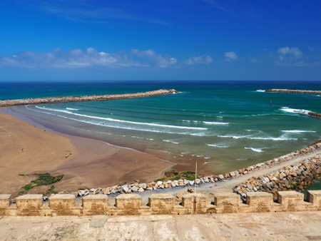 Sea view from Essaouira city walls, Morocco. Nice weather, sun and silent sea with wide beach.の写真素材