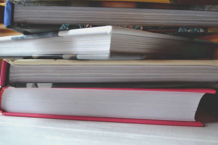 Books on the white desk.