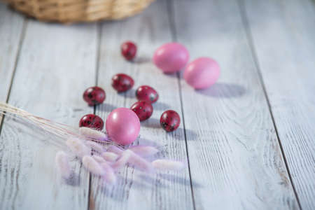 pink easter eggs on gray wooden table. background. cardの写真素材