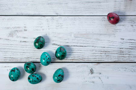 blue eggs on a gray wooden table. Mimimai. Card with space for text.の写真素材