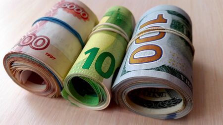 A lot of money, different countries, different equivalents.Business photos.の写真素材