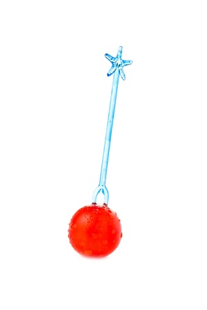 Fresh cherry tomato with a color stick  isolated on white background の写真素材