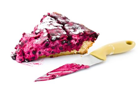 A piece of blueberry pie and knife isolated on white backgroundの写真素材