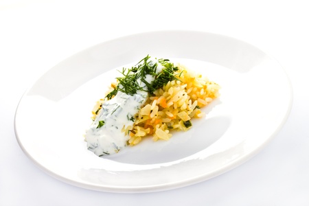 White rice with garlic sauce on a plate  on white backgroundの写真素材