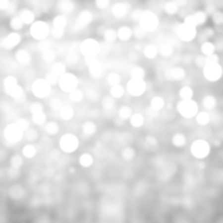 Silver Lights Festive Christmas  background with texture. Abstract Christmas twinkled bright background with bokeh defocused  lightsの写真素材