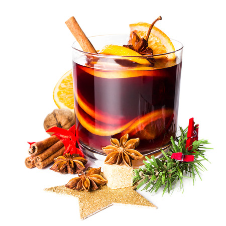 Christmas Hot mulled wine for winter with spices isolated on white background, closeup.の写真素材