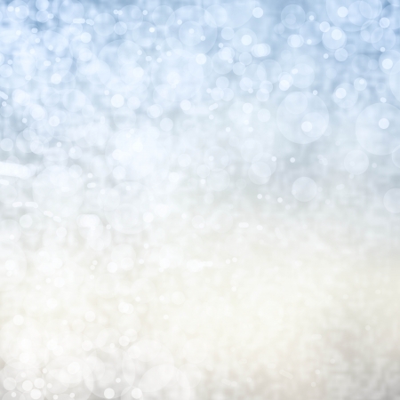 Blue Glittering Lights Festive background with texture. Abstract Christmas twinkled bright background with bokeh defocusedの写真素材