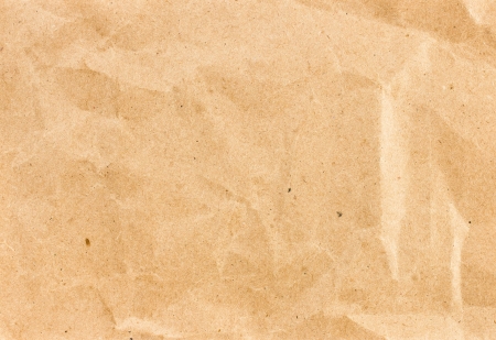 Crumpled  recycled paper  background texture. Vintage craft paper texture yellow   color. Paper for package.の写真素材