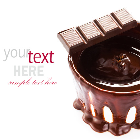 Cup of hot chocolate cocoa flow isolated on white background, close upの写真素材