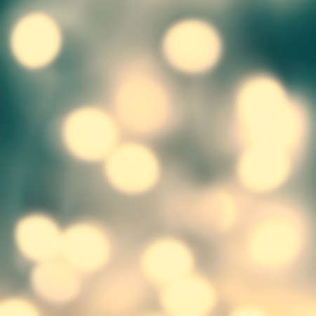 Elegant Abstract Glowing  lights background with blur golden lightsの写真素材