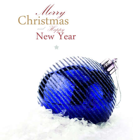 Christmas decoration with  big blue bauble and snow  (with easy removable sample text)の写真素材