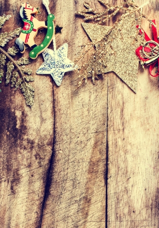 Christmas border with  festive decorations and copy space on wooden old background. Vintage Christmas  frame. の写真素材