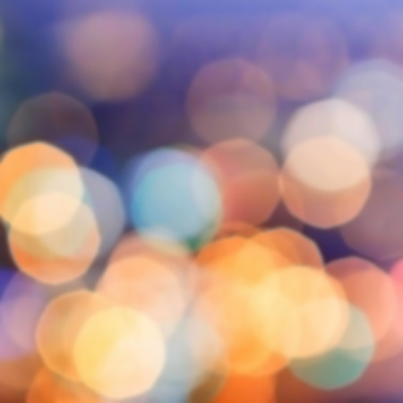 Magic background with colorful bokeh. Festive background with natural bokeh and bright golden...