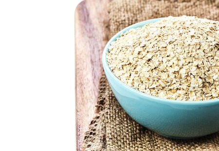 Oat flakes for Breakfast isolated on white background with copyspace. の写真素材