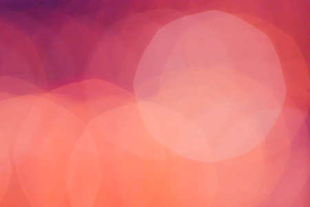 Red Christmas  background. Glitter vintage lights background with gold and black lights, defocused. Xmas and New Year feast bokeh background with copyspace.の写真素材