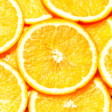Orange Background. Slices of fresh orange fruit  closeup. Healthy food. background.