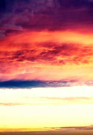 Beautiful sunset above the city with beauty vivid  sky. Sunny dawn in a city landscape.