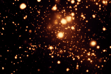 Abstract background with glitter bokeh lights. Image is blurred and filtered. Christmas Card