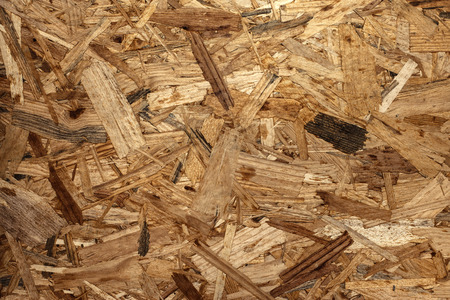 OSB material Texture - Recycled compressed wood chippings board, plywood texture.