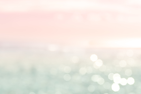 Abstract twinkled bright background with natural bokeh defocused white lights.の写真素材