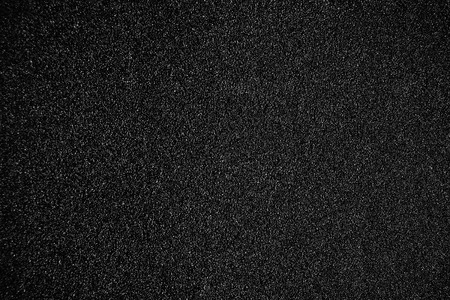 Black textured background - Sandpaper texture for Backdrop. Abstract rough sandpaper sheet close up for banner, poster, ad, template, designの写真素材