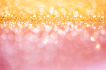 Defocused Bokeh twinkling lights Vintage background. Christmas background. Festive blur background.の写真素材