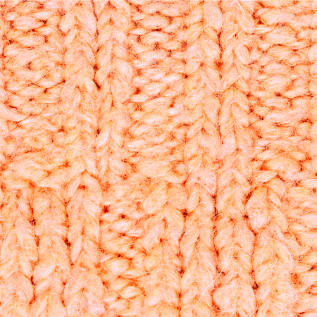 Texture of knitted woolen fabric for wallpaper. Colorful sweater abstract background
